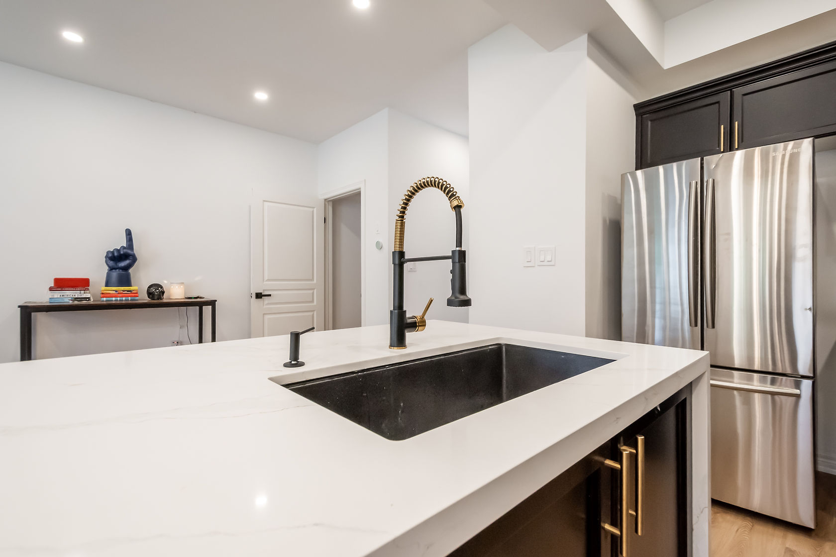Professional wide-angle finished kitchen with excellent material contrast and clean staging — premium portfolio shot — Stonehenge, Hamilton | MTC Renovations